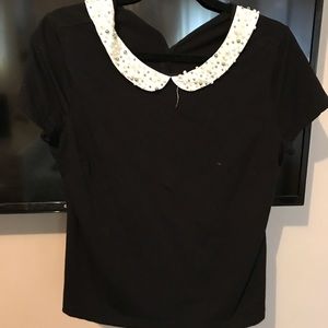 Black shirt with pearl color